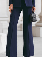 Women's tailored blazer and wide leg trousers set in a sophisticated design, perfect for business formal occasions, featuring a flattering fit and elegant style. 2