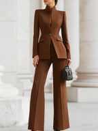 Women's tailored blazer and wide leg trousers set in a sophisticated design, perfect for business formal occasions, featuring a flattering fit and elegant style. 4