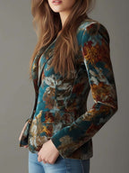 Women's tailored vintage floral velvet blazer in rich hues, perfect for casual outings or elegant evening wear, featuring a sophisticated design and flattering fit. 1