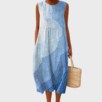 Women's tiered midi dress in lightweight fabric, perfect for summer casual outings, featuring adjustable straps and a flattering silhouette. 2