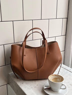Women's vintage leather tote bag featuring a spacious design, perfect for office use, shopping, and day trips. 0