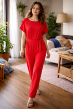 Women's wide leg jumpsuit featuring short sleeves and a stylish tie belt, perfect for casual and dressy occasions. 0