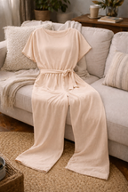 Women's wide leg jumpsuit featuring short sleeves and a stylish tie belt, perfect for casual and dressy occasions. 8