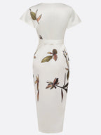 Plus size women's wrap dress featuring a tie waist, designed for formal summer occasions, showcasing a flattering silhouette and elegant style. 6