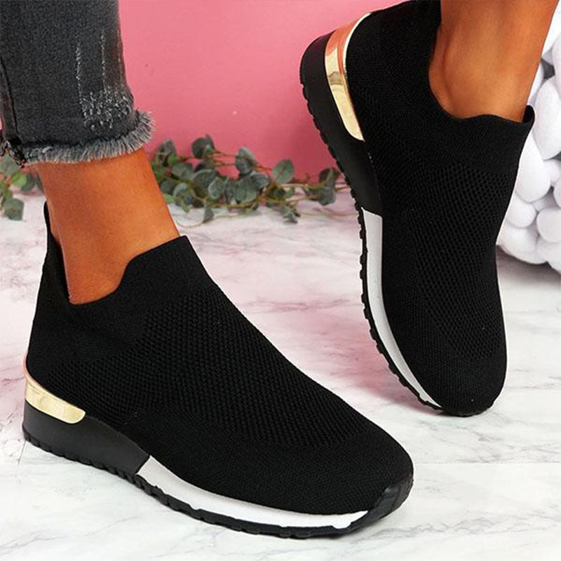 Knit slip-on walking sneakers in black