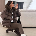Warm longline puffer winter coat with faux fur hood