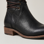 Studded lace-up mid-calf leather boots with block heel